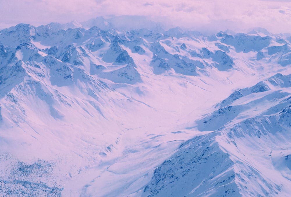 brown and white mountains during daytime