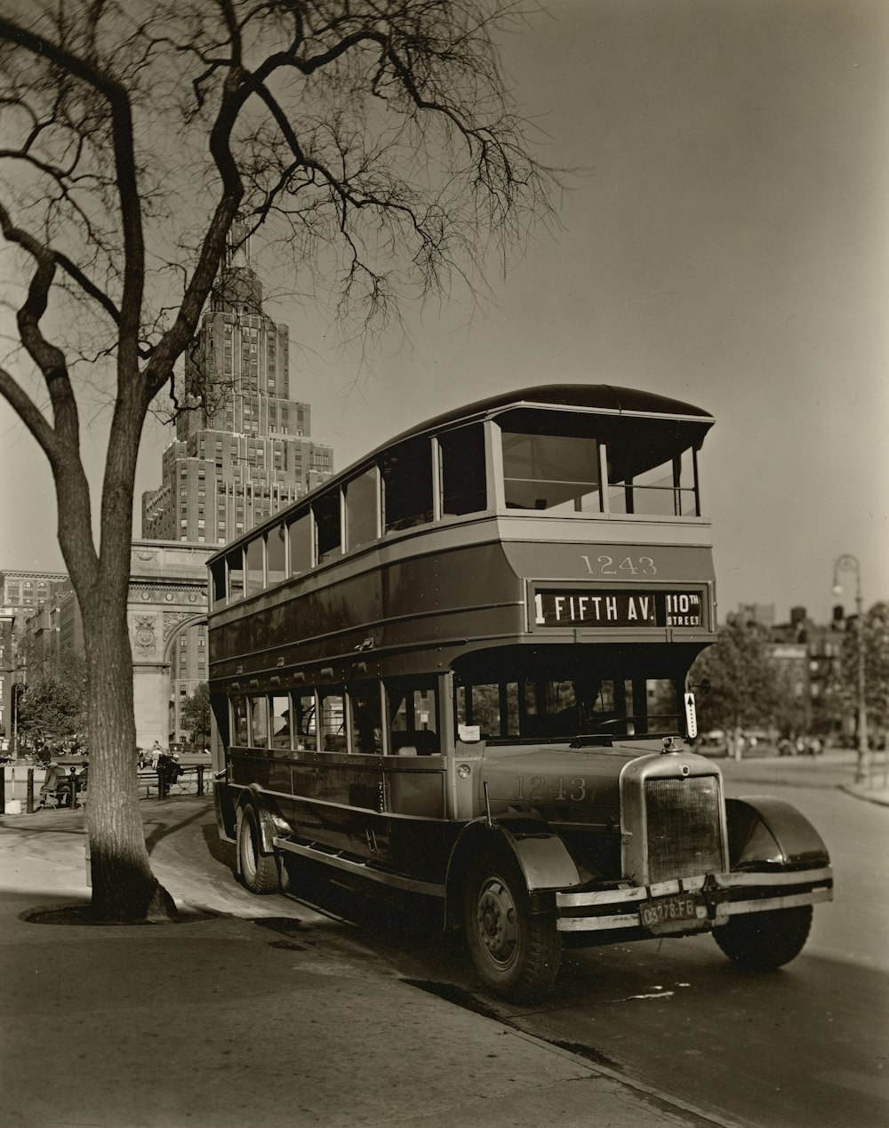 grayscale photo of double decker bus on road