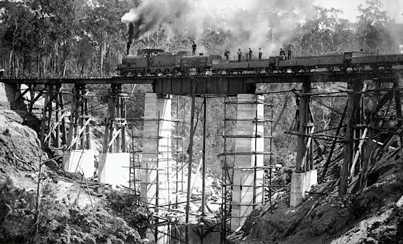 grayscale photo of metal tower