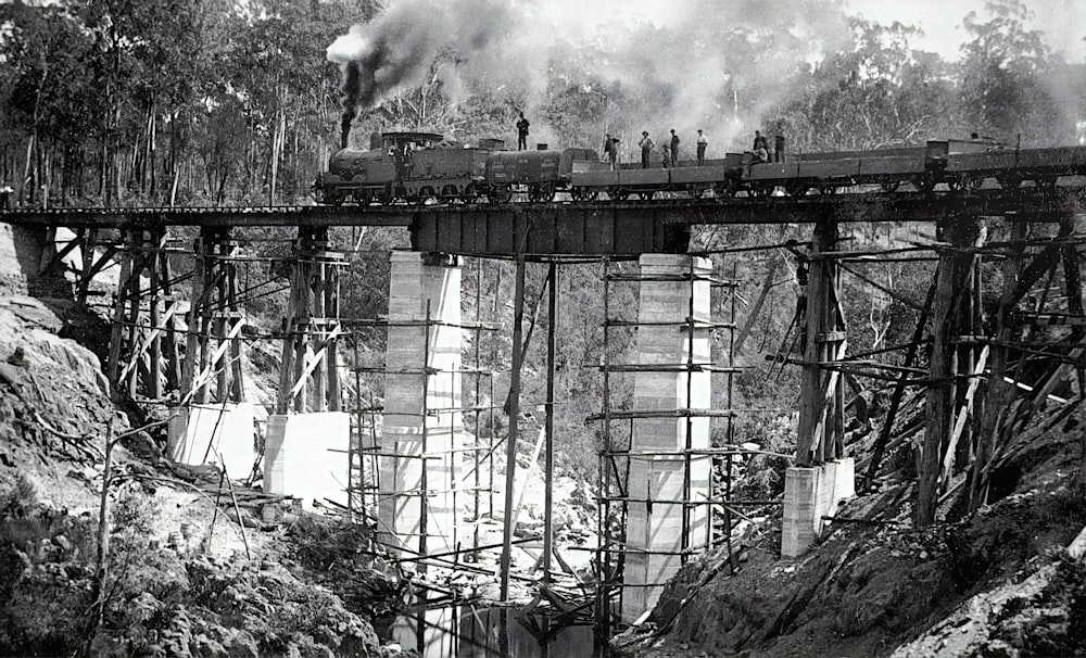 grayscale photo of metal tower