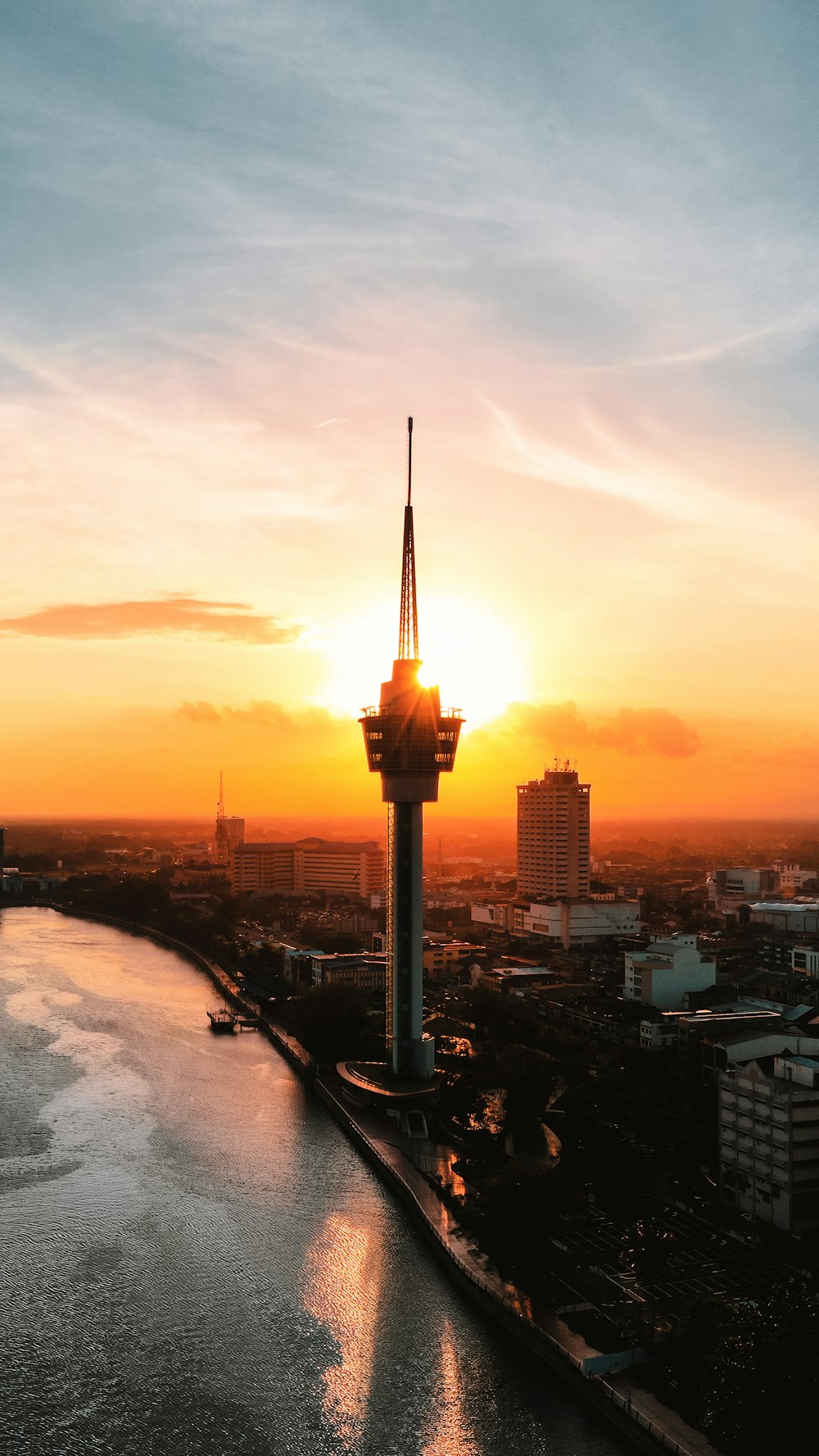 city skyline during sunset with tower