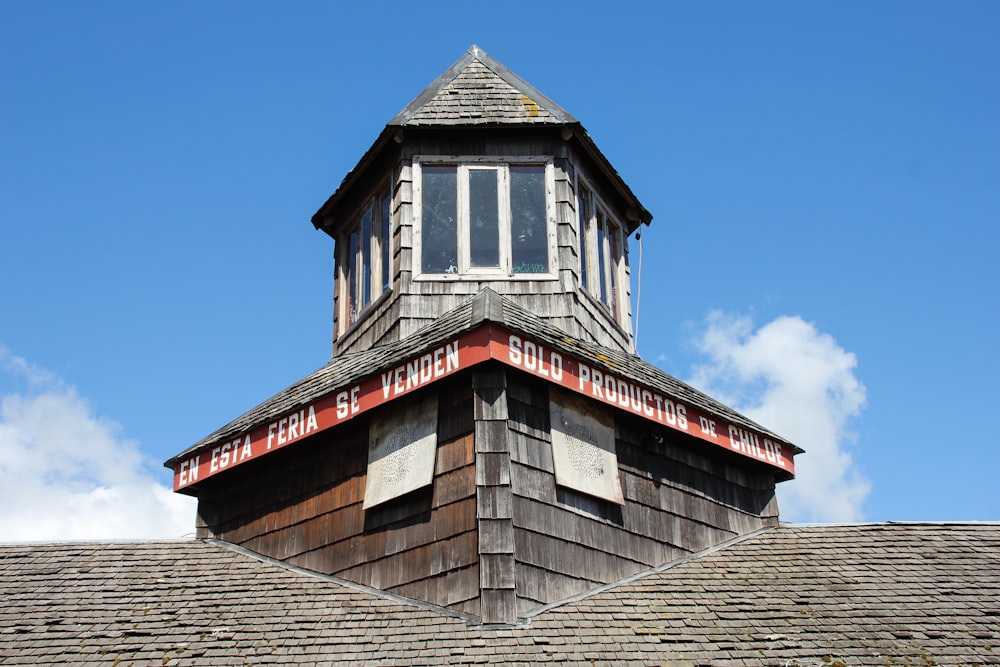 brown and gray concrete building under blue sky during daytime