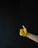 A satisfied customer showing a thumbs up in a newly painted room.