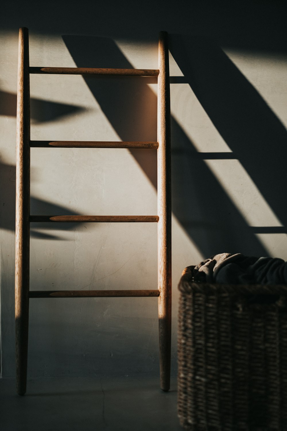 black and white backpack on brown woven basket