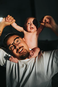 man in white crew neck t-shirt lying on bed