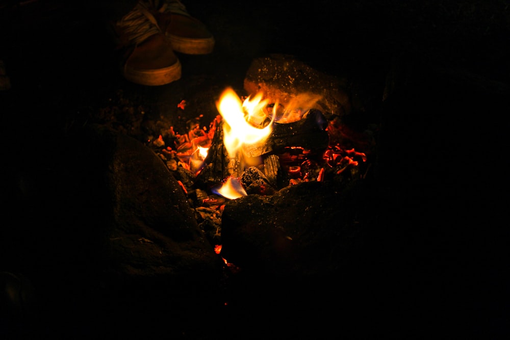 fire on fire pit during night time
