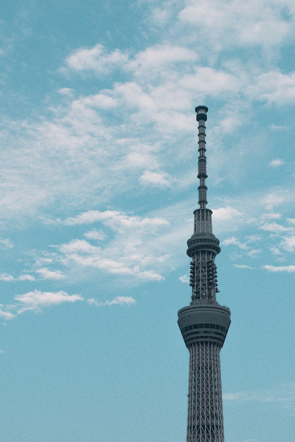 gray concrete tower under blue sky during daytime