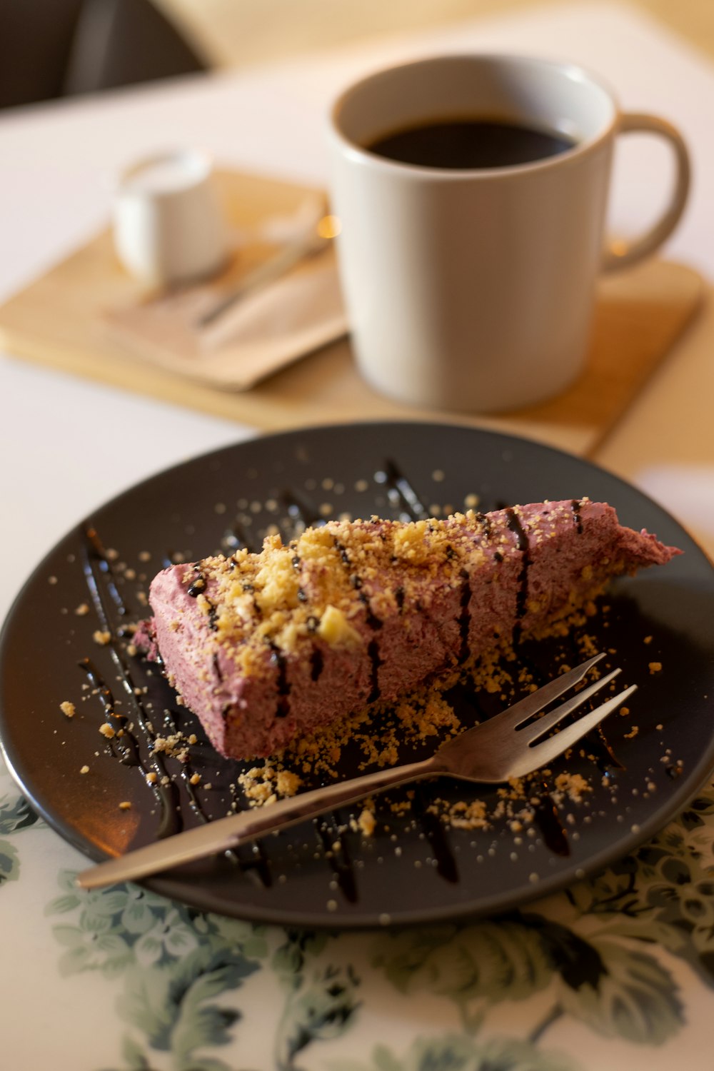 brown and yellow cake on black plate