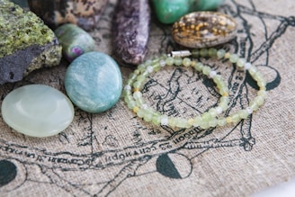 a close up of a bunch of stones on a cloth