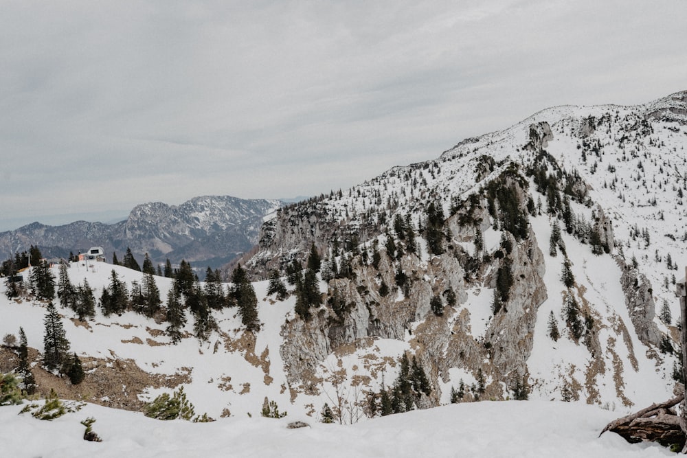 snow covered mountain during daytime