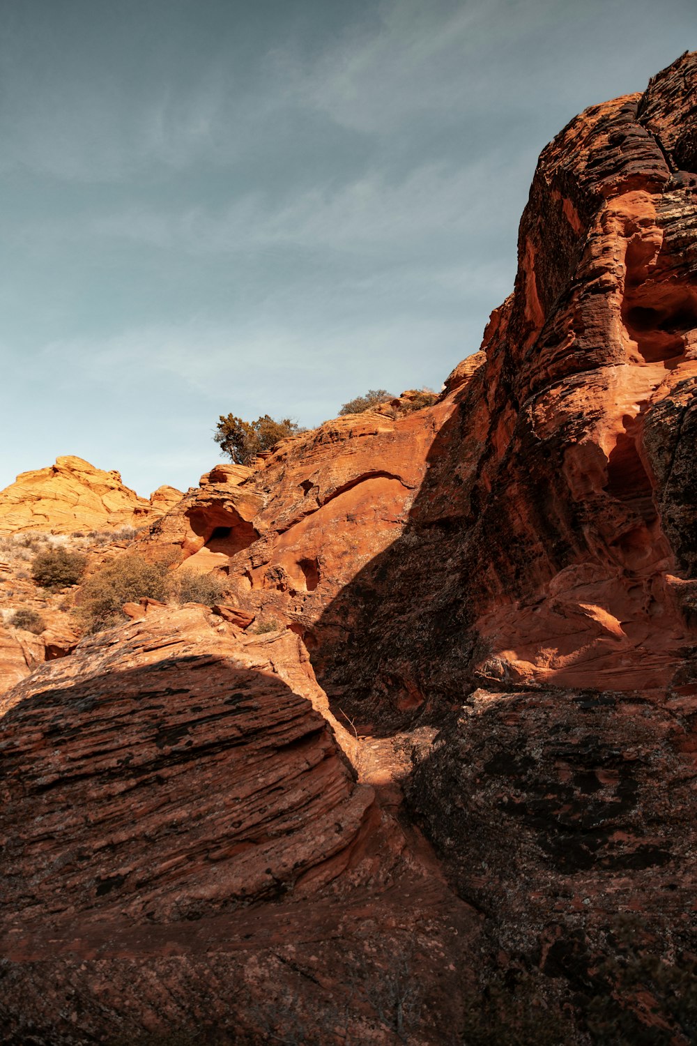 brown rocky mountain under blue sky during daytime