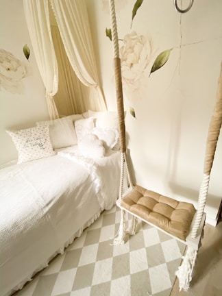 A serene bedroom with soft colors and inviting textures.