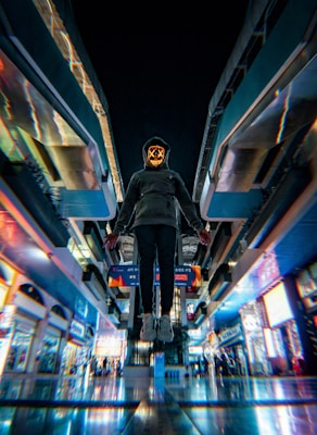 neon-lit model wearing oversized pixel drip hoodie in a dark cyberpunk alley