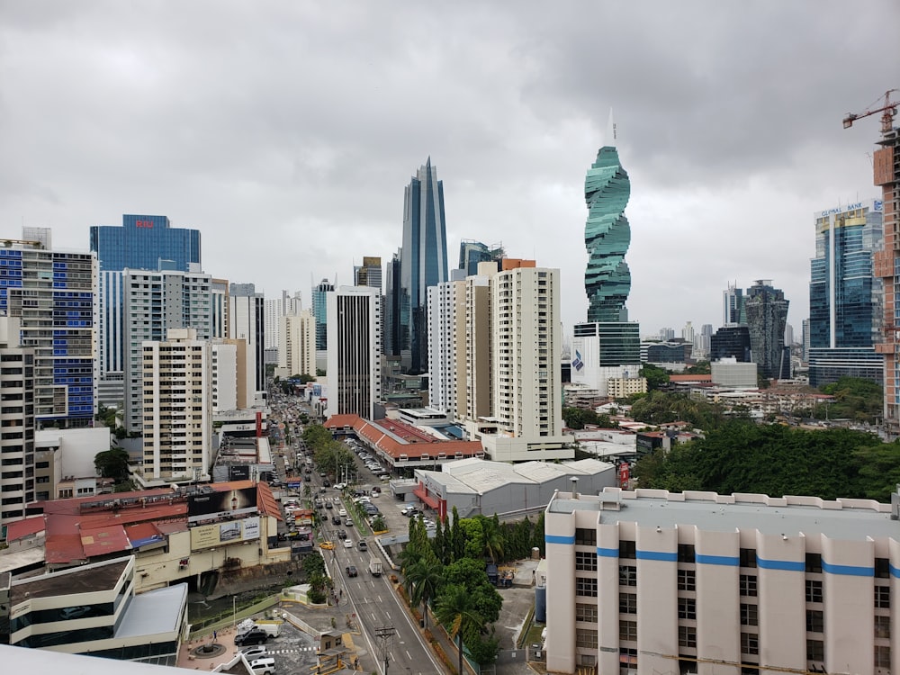 high rise buildings under white sky during daytime