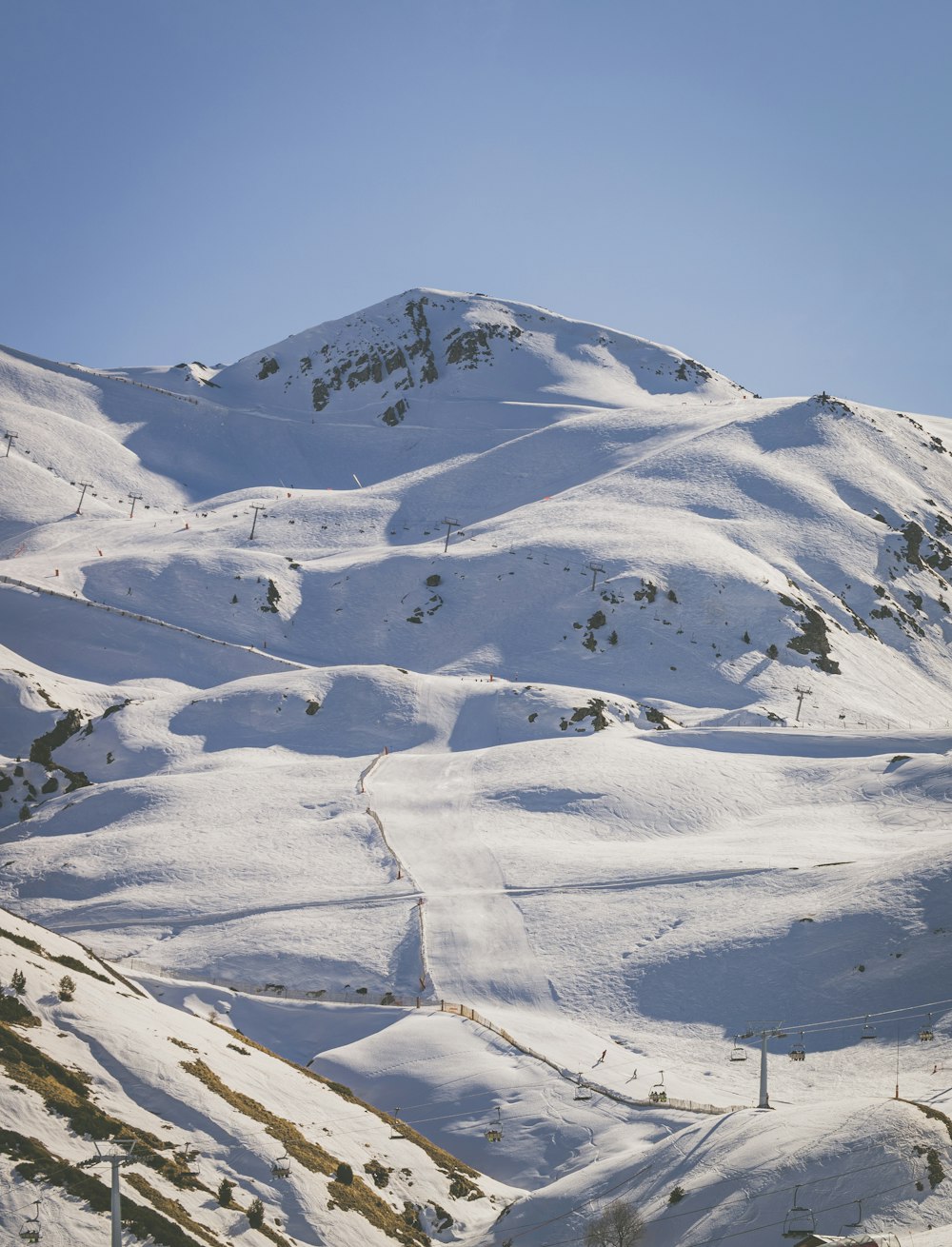 snow covered mountain during daytime