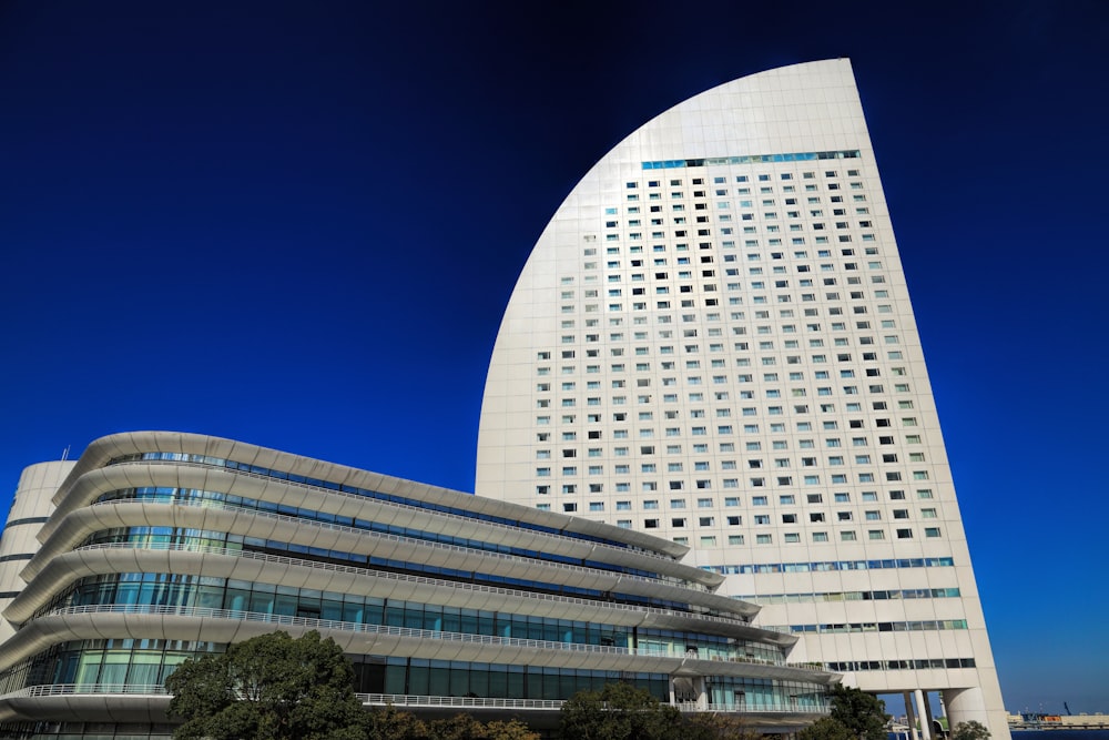 white concrete building under blue sky during daytime