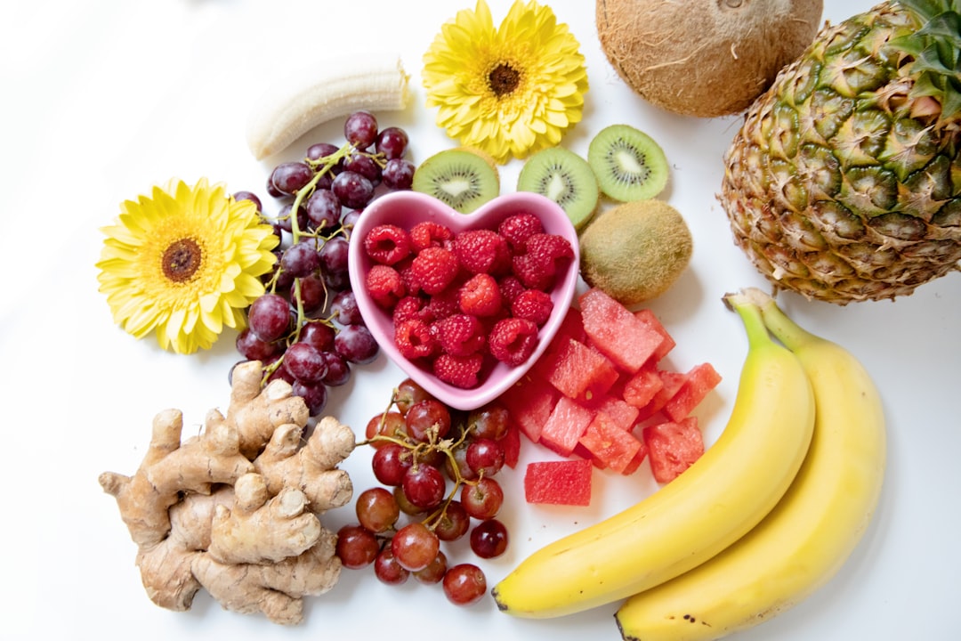 yellow banana fruit and red fruits