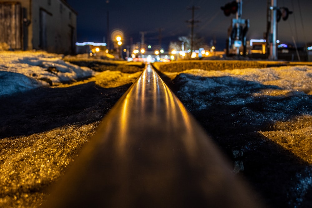 black and yellow road during night time