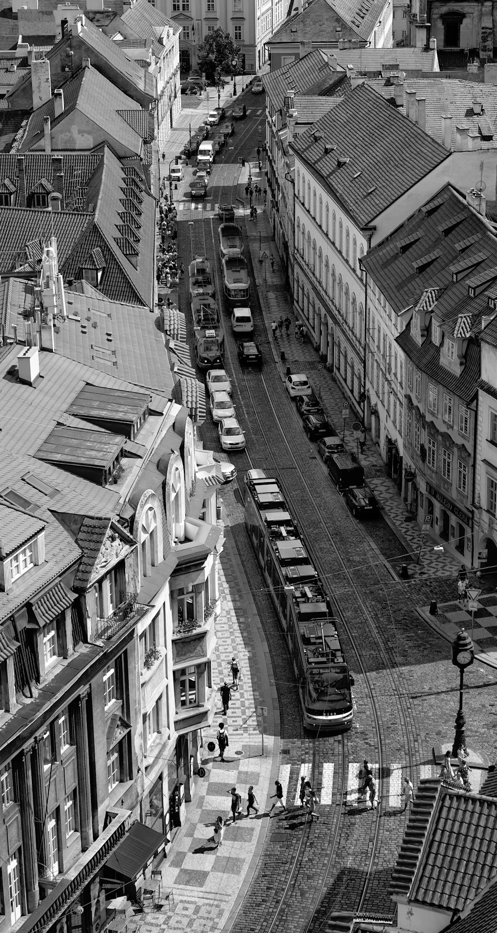 grayscale photo of city buildings