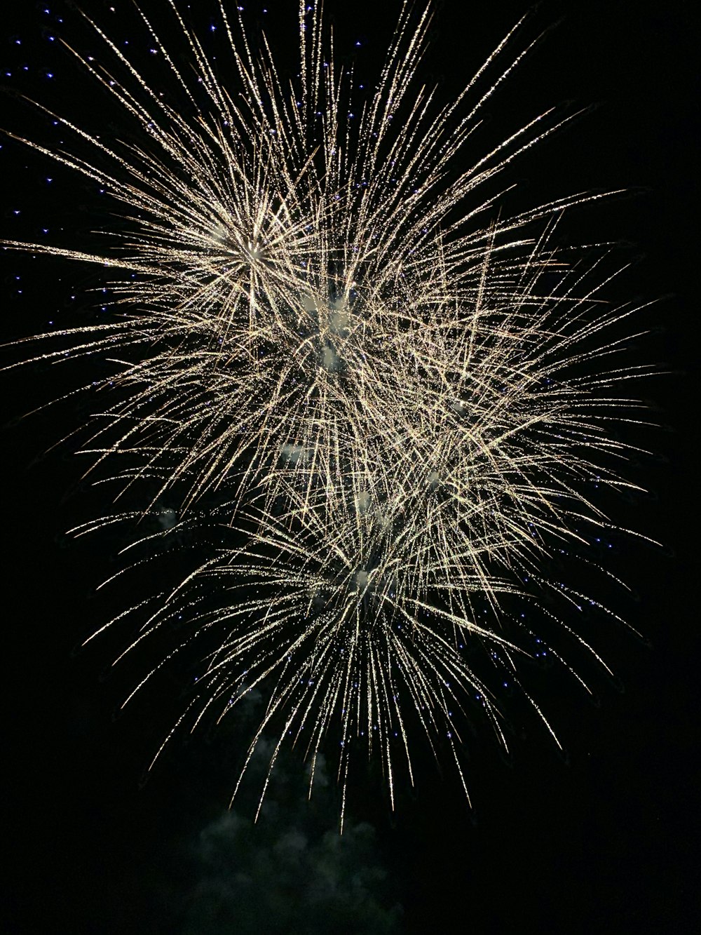 white fireworks in the sky during night time