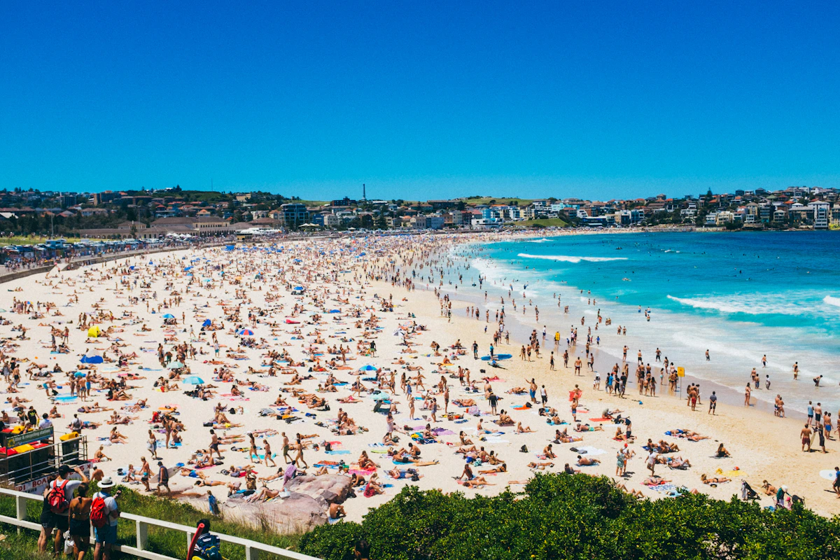 A sunny beach day under blue skies