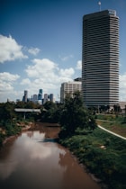 high rise buildings near river during daytime
