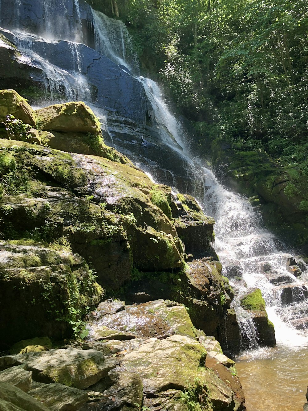 water falls on rocky mountain