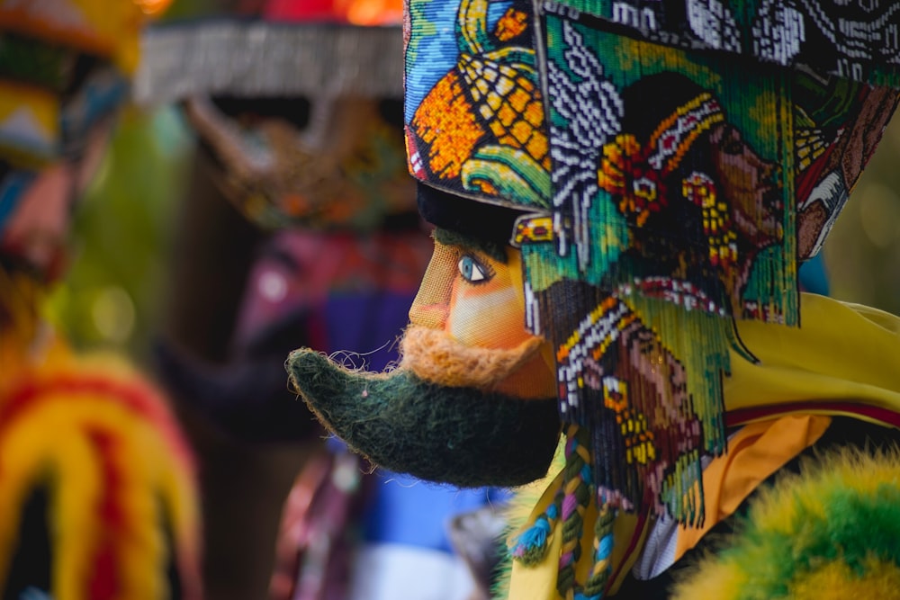 a close up of a person wearing a colorful costume