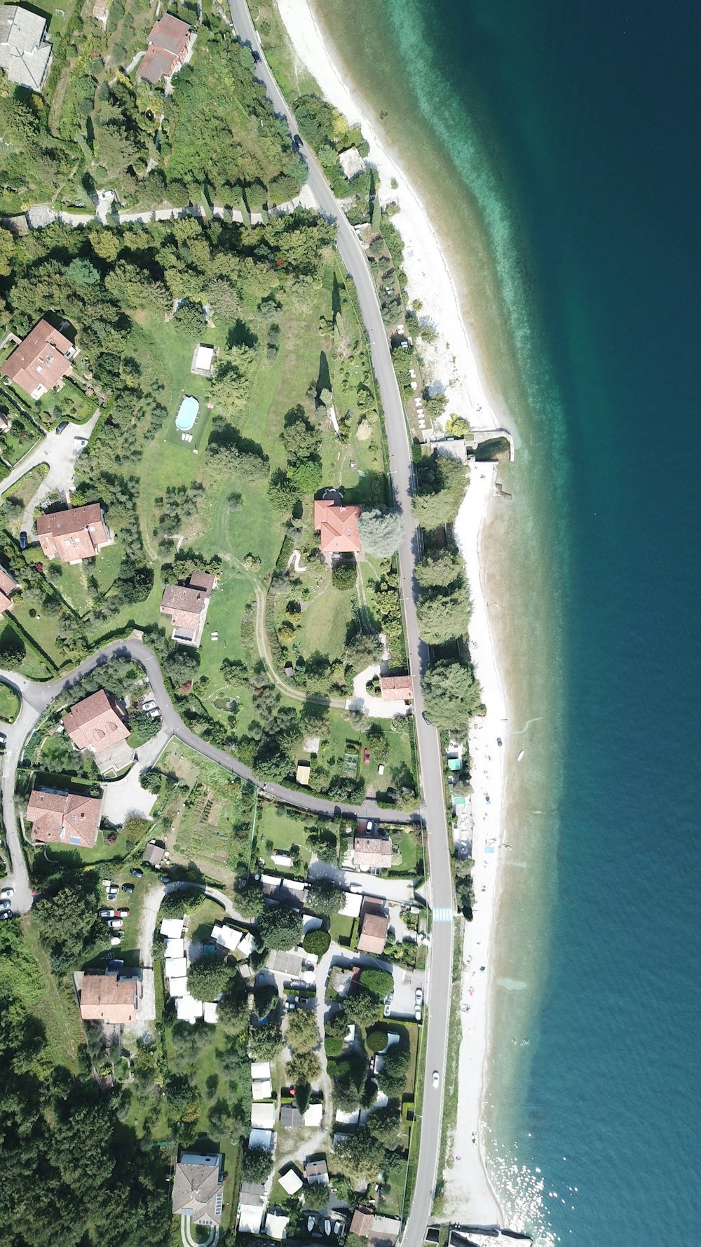 aerial view of city near body of water during daytime