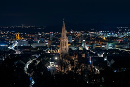 aerial view of city buildings during night time in Freiburg im Breisgau Germany