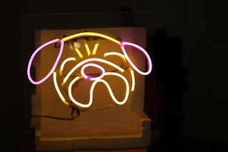 A tense moment as Pinky studies the dog racing odds under dim neon lights.