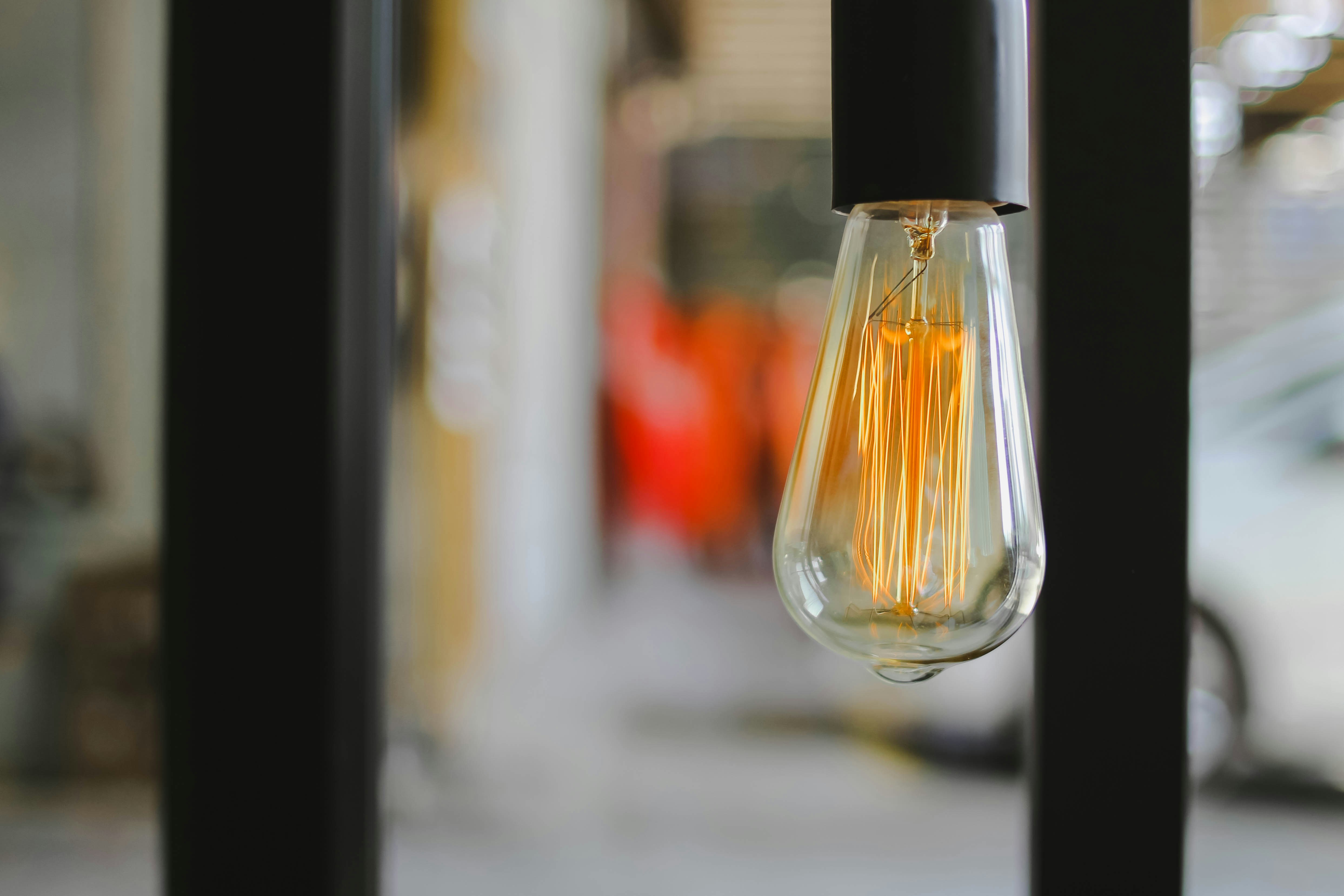 clear glass bottle with black lid