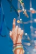 persons hand with blue light