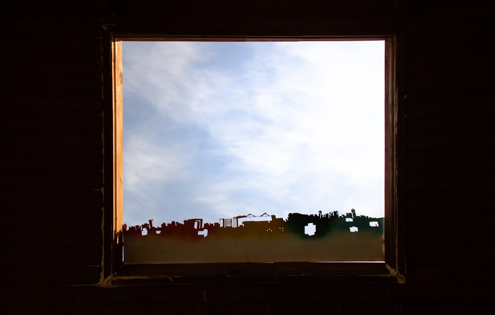 brown wooden framed glass window