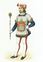 A historical figure is depicted wearing a flamboyant outfit featuring a tunic with a large heraldic emblem on the front. The attire includes white and red tights, a matching hat with a feather, and a blue long-sleeve shirt underneath. The figure holds a golden scepter, standing confidently with one hand on the hip.