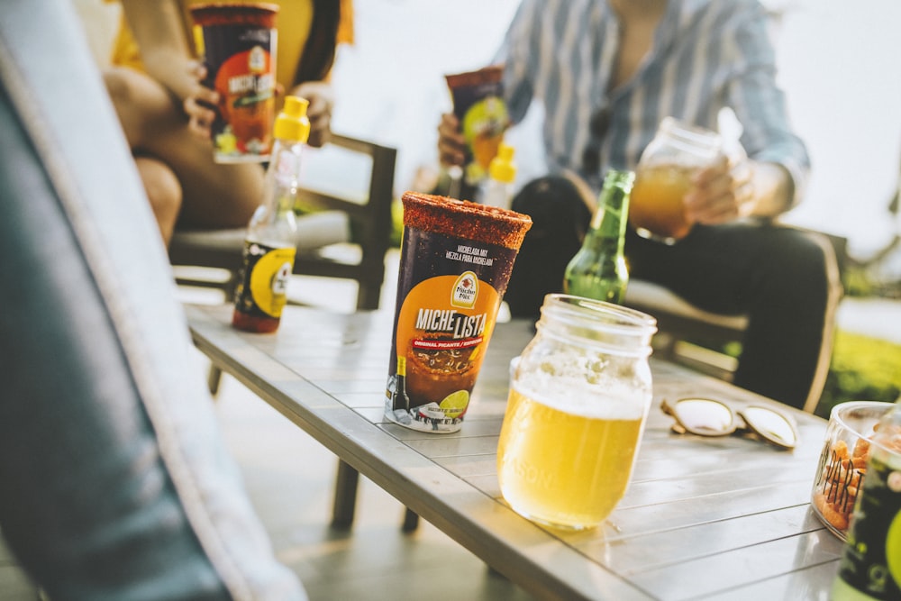 clear drinking glass with beer on table