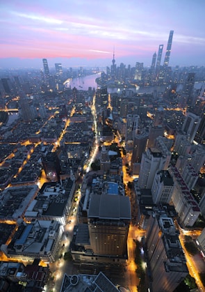 aerial view of city buildings during night time