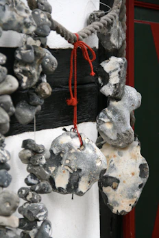 Polish flint stones arranged artistically on a wooden surface with soft natural light.