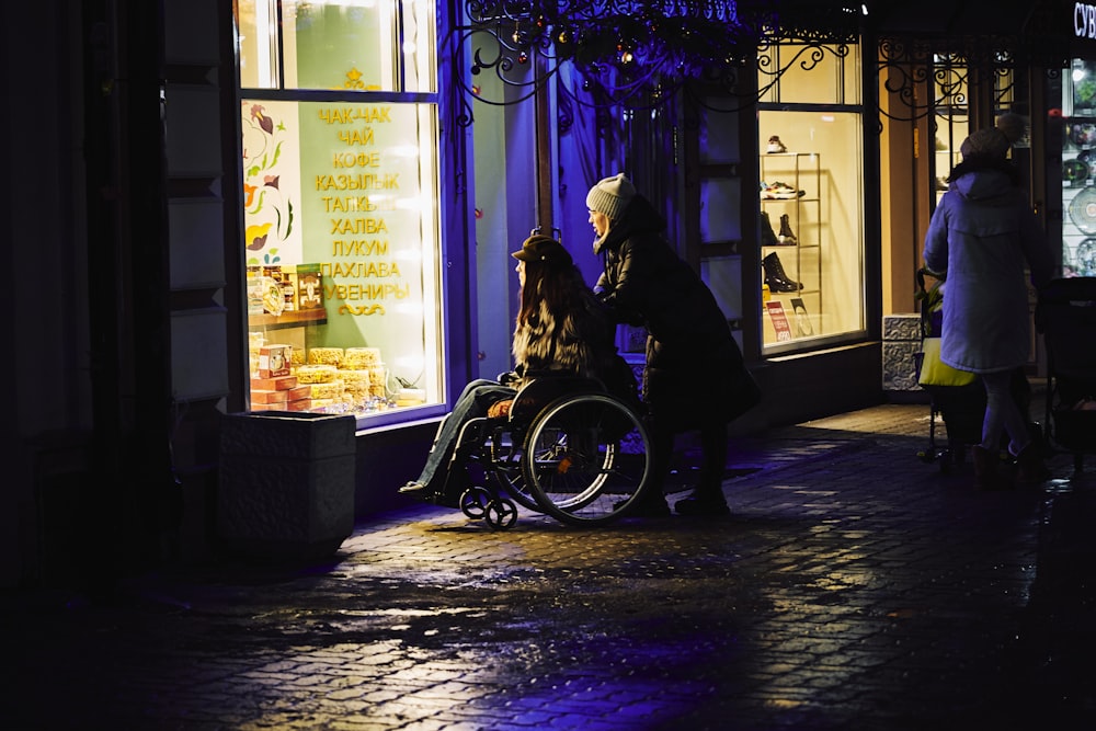 man in black jacket sitting on black motorcycle