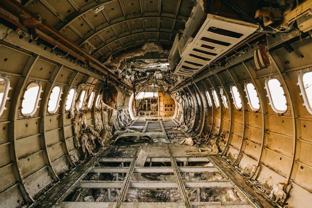 brown and white tunnel with white light