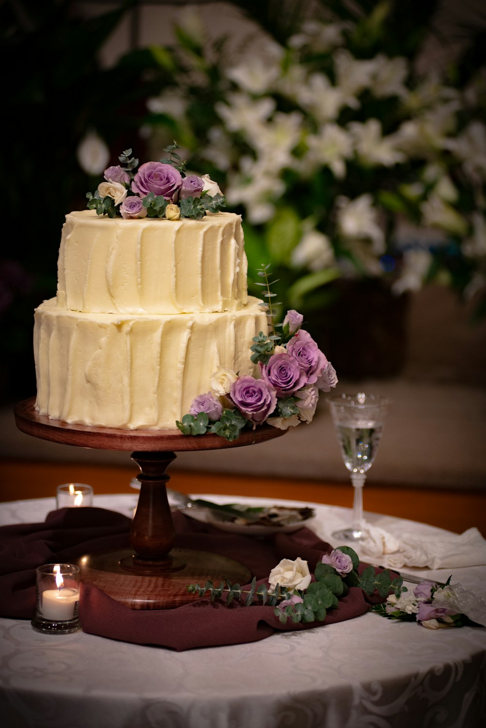 white cake on brown wooden table