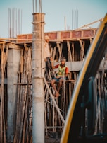 Workers collaborating on a construction site.
