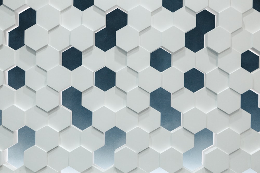 a close up of a wall made of hexagonal tiles