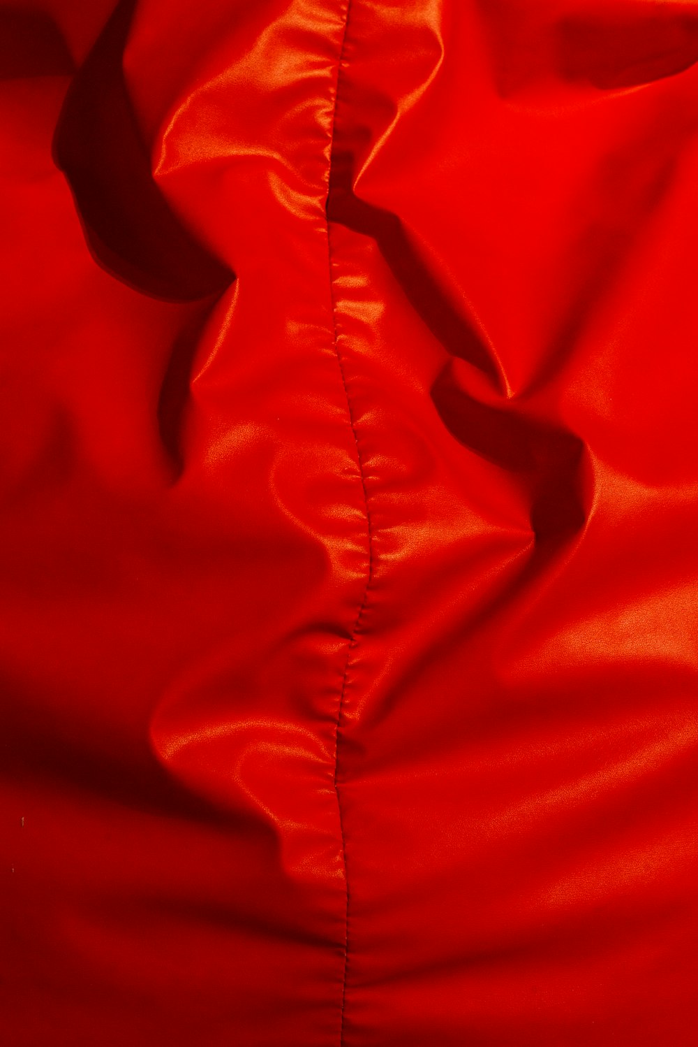 red textile on white textile