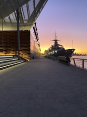 black ship on dock during daytime