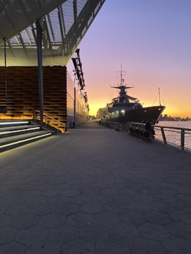 black ship on dock during daytime