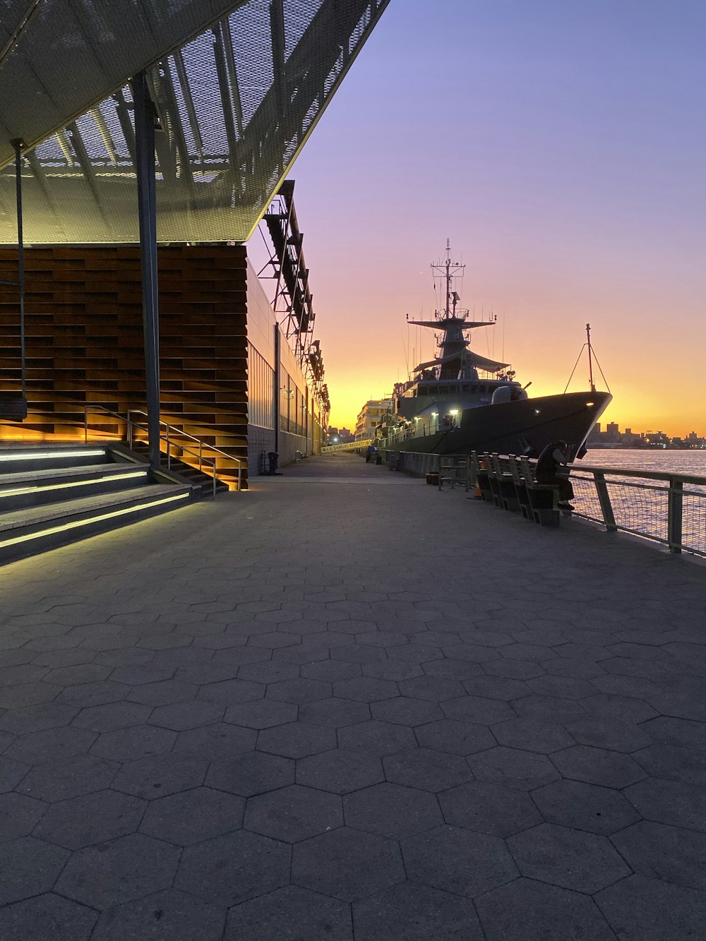 black ship on dock during daytime