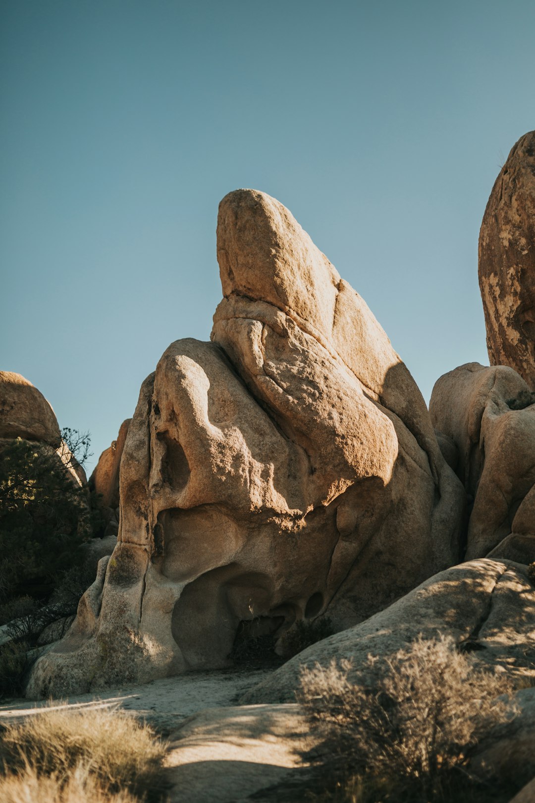 brown rock formation under blue sky during daytime