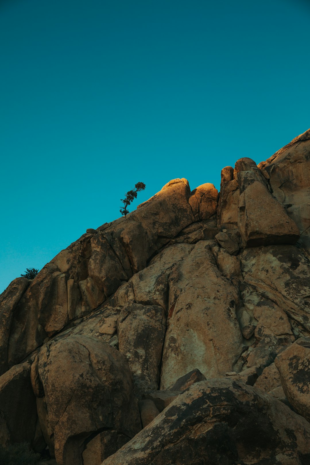 brown rock formation under blue sky during daytime