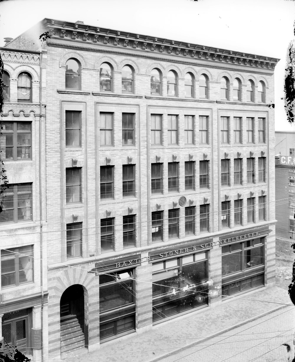 grayscale photo of concrete building